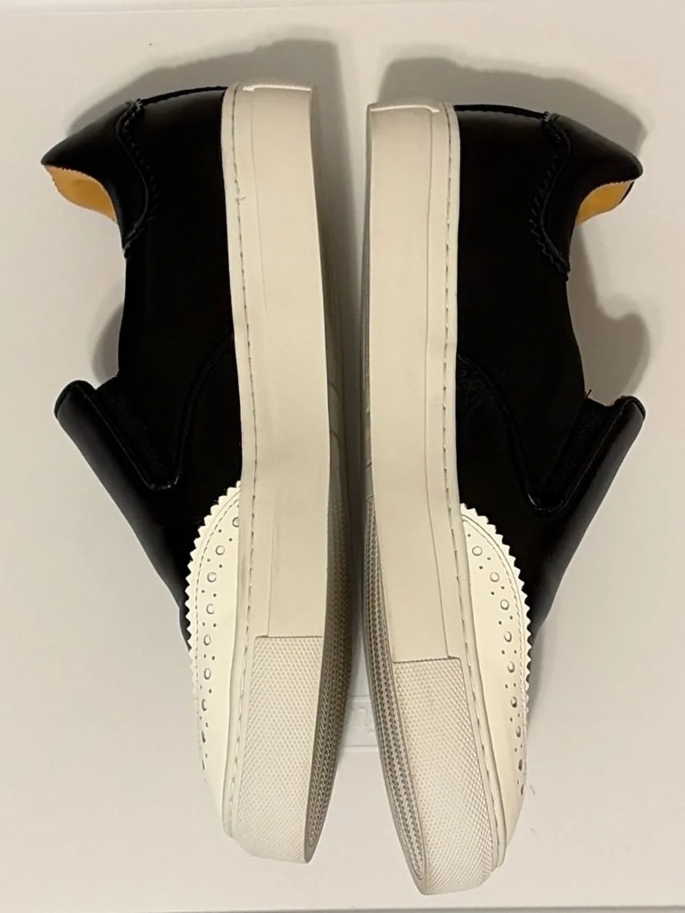 Black and White Slip-On Wingtip Sneakers for Women